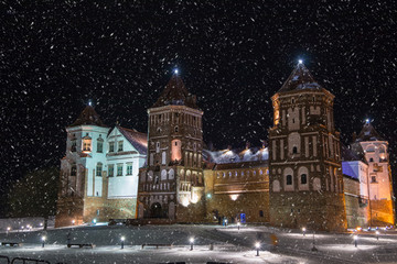 Fototapeta na wymiar Mir Castle in Belarus. Beautiful palace at night. Winter.