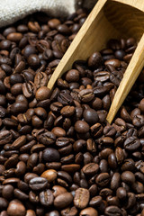 bag of roasted coffee beans, concept photos, vertical closeup