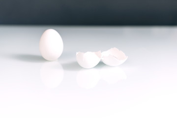 Egg white and egg shell isolated on a contrasting background. Concept Of Easter. Concept of healthy eating.