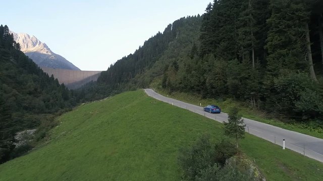 Recreational long drive on the countryside calm peak ghat roads of Zillertal Alps Austria
(drone shot) (establishing shot)