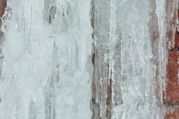 Very large and dangerous icicles in close up