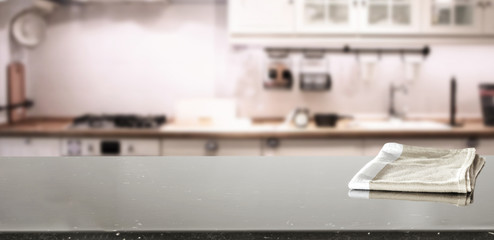 Table background of free space with napkin decoration and kitchen background 