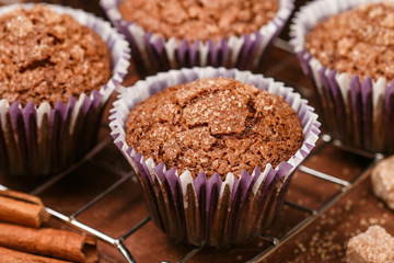 homemade Coffee muffins with cinnamon and brown sugar close-up. Traditional American dessert.  Selective focus