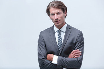 thoughtful businessman adjusting his tie.