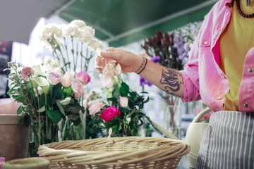 Close up of male hand that throwing petals