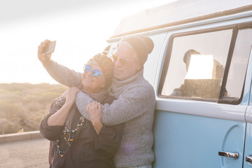 Happy old senior adult couple enjoy and have fun together with love in vacation and outdoor leisure...