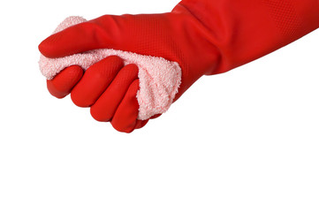 Hand with red dishwashing silicone cleaning glove squeezing a pink sponge