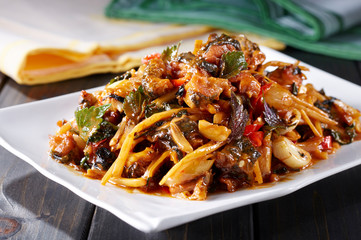 Delicious Chinese food, stir fried meat in hot and sour sauce

