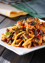 Delicious Chinese food, stir fried meat in hot and sour sauce


