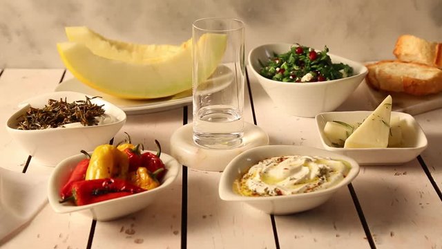 filling water to Turkish  raki