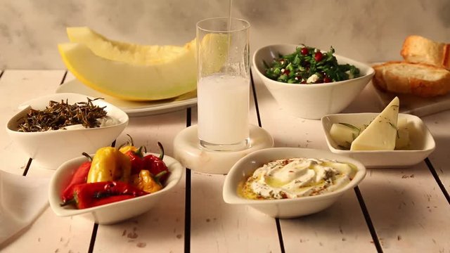 filling water to Turkish  raki