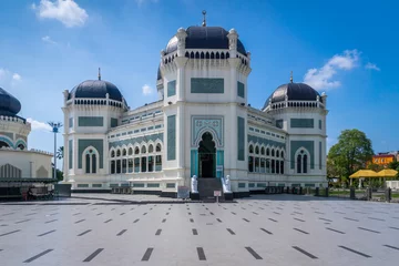 Foto op Canvas Great Mosque of Medan or Masjid Raya Al Mashun is a mosque located in Medan, Indonesia. The mosque was built in the year 1906 and one of the largest in Medan. © uskarp2