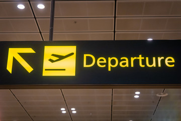 Airport departure signboard and icon - international flight departure information sign at airport