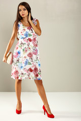 Slim young woman and spring dress 