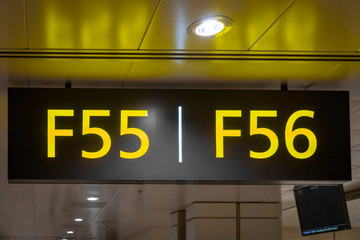 Airport Boarding gate entrance number sign board in departure area