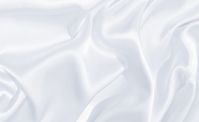 Fototapeta premium The texture of the satin fabric of white color for the background