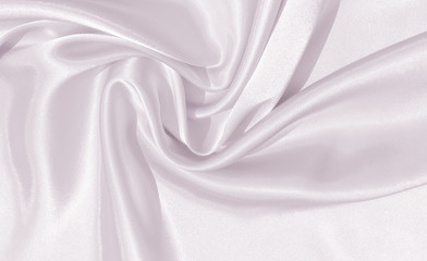 The texture of the satin fabric of lilac color for the background