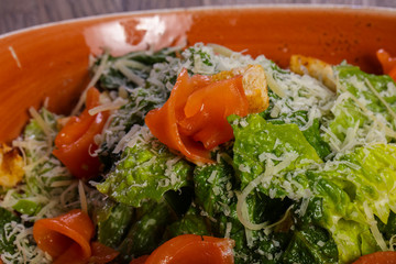 Caesar salad with salmon