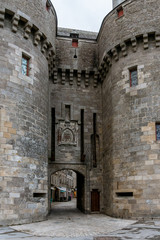 Fototapeta na wymiar Gate in the wall of the city of Guerande in French Brittany