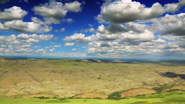 Timelapse view of the highland valley with clouds from the height of the Mount Udabno. David Gareja monastery complex.