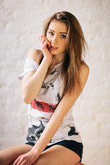 Fototapeta premium Amazing girl posing in loft photostudio
