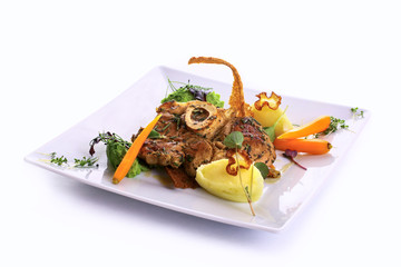 Beef osso bucco on port wine with peas and vegetable puree