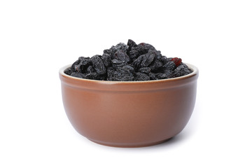 Fototapeta na wymiar Bowl with dried dark raisins isolated on white. Healthy nutrition with fruits