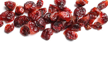 Cranberries on white background, top view with space for text. Dried fruit as healthy snack
