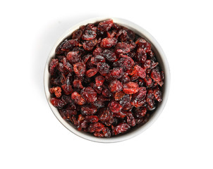 Bowl with cranberries on white background, top view. Dried fruit as healthy snack