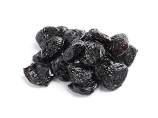 Heap of tasty prunes on white background. Dried fruit as healthy snack