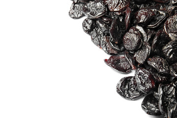 Many tasty prunes on white background, top view with space for text. Dried fruit as healthy snack