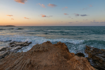 Fototapeta na wymiar Mediterranean Sea. Greek island Crete. Sunset on the beach