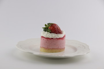 Close up Strawberry Cream Cake on White Background