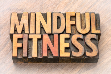 mindful fitness word abstract in wood type