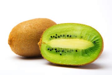 Ripe whole kiwi fruit and half kiwi fruit isolated on white background