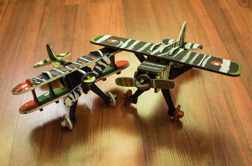 toy airplane on a wooden board