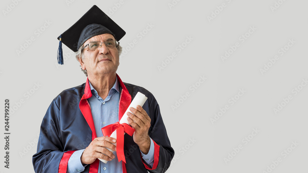 Wall mural Senior adult man in cap