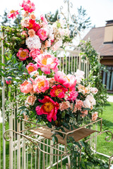 Fototapeta premium Chic peonies in the decoration of the wedding arch