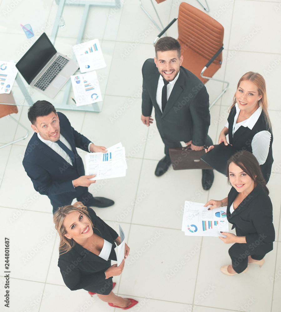 Canvas Prints view from the top.business team discussing marketing charts,standing in the office.