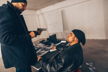 Angry robbers having a fight