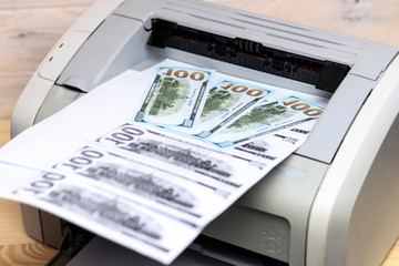 printed dollars. home printer. concept, crime, fake money