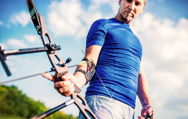 Archer. Sportsman practicing archery. Sport, recreation concept