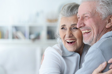 portrait of a happy senior couple at home