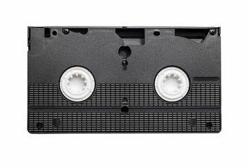Fototapeta premium Black vhs tape isolated on white. Outdated technology background.