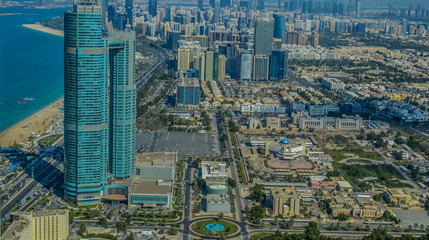 Bird's eye and aerial drone view of Abu Dhabi city from observation deck