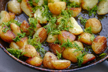 fried chicken with dill roast in a skillet
