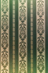 Vintage ornamental green patterns wallpaper. Victorian style backdrop.