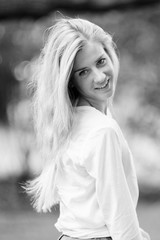 Attractive sexy blond posing at the city