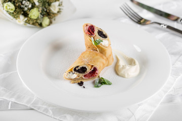 Pancakes with berry jam and poppy filling