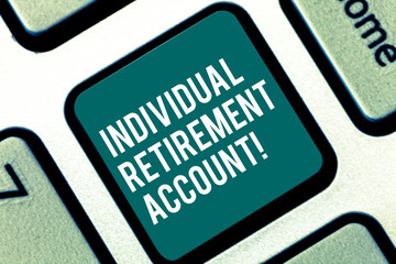 Handwriting text Individual Retirement Account. Concept meaning Invest and earmark funds for retirement Keyboard key Intention to create computer message pressing keypad idea
